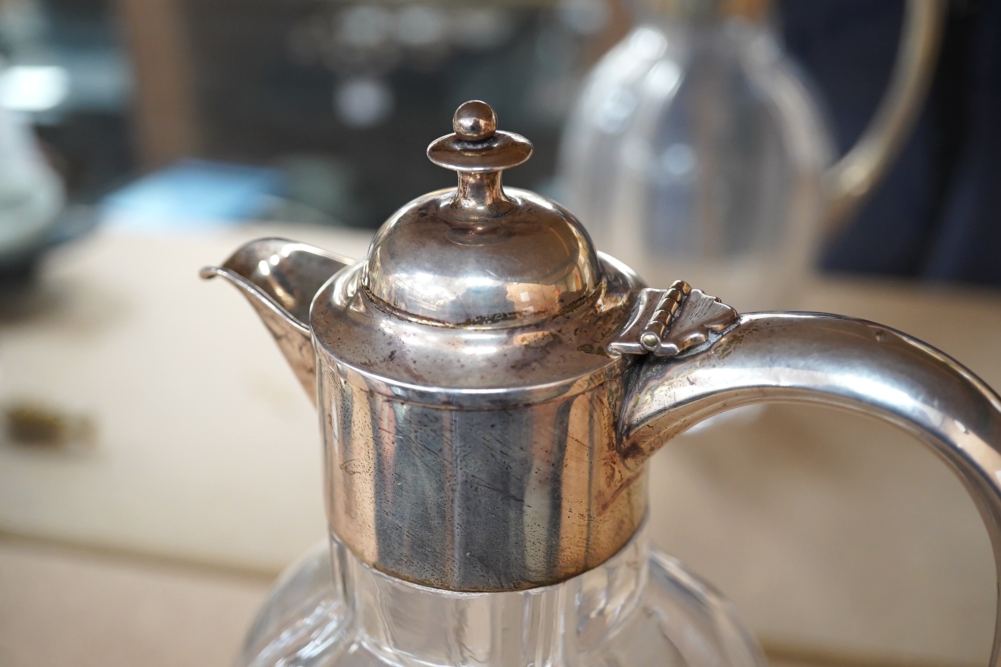 An Edwardian silver mounted glass claret jug, William Henry Leather, Birmingham, 1901, 25.3cm. Condition - poor